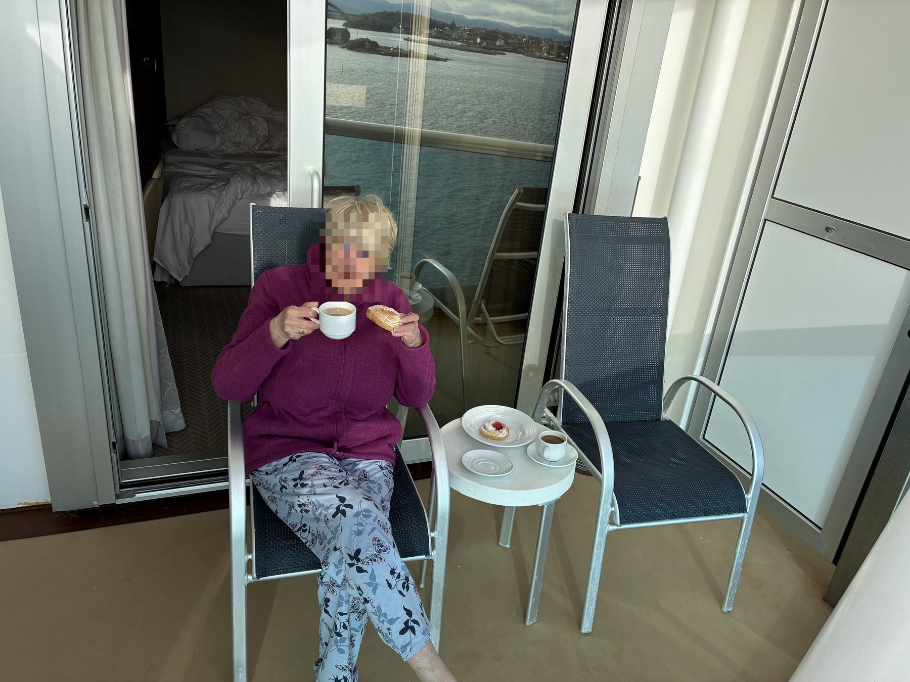 Mum on the balcony with coffee
