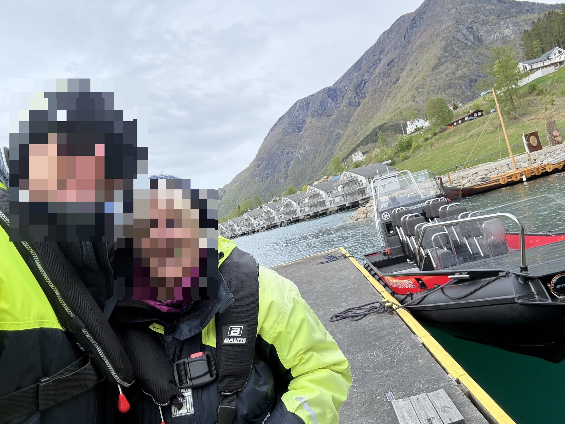 At the dock with the red speedboat