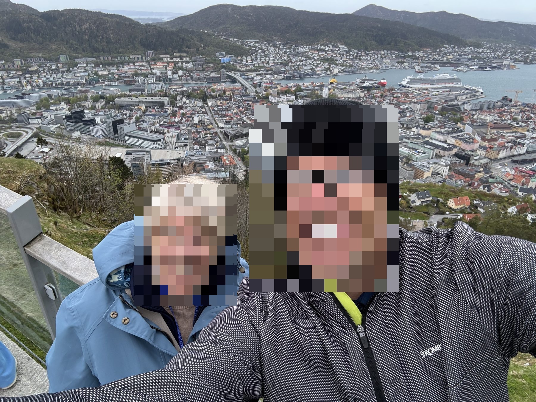 Mount Fløyen summit selfie with Bergen below